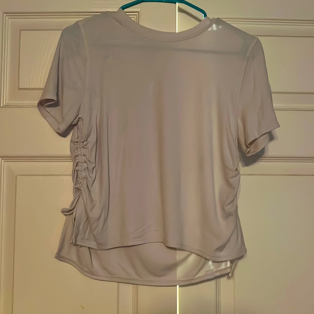 Women’s Lululemon top size medium never worn scrunched sides
